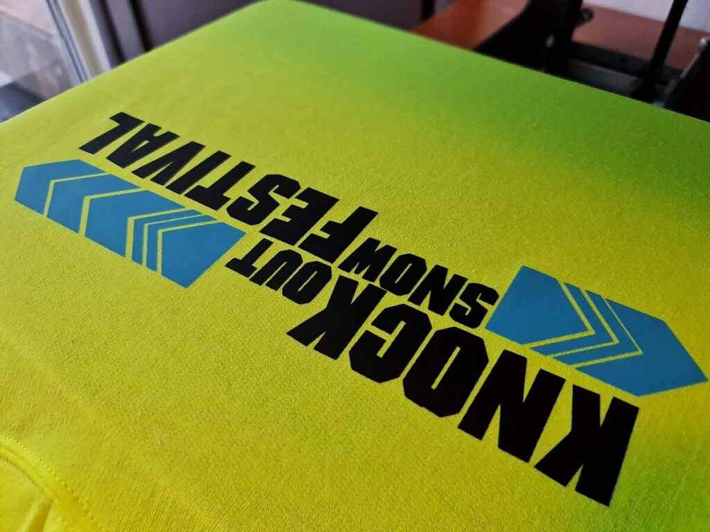 Two-colour print on a bright hoodie for Knock Out Snow Festival