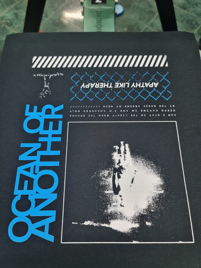 Two-colour A3 screen print on black t-shirts for the band Ocean of Another