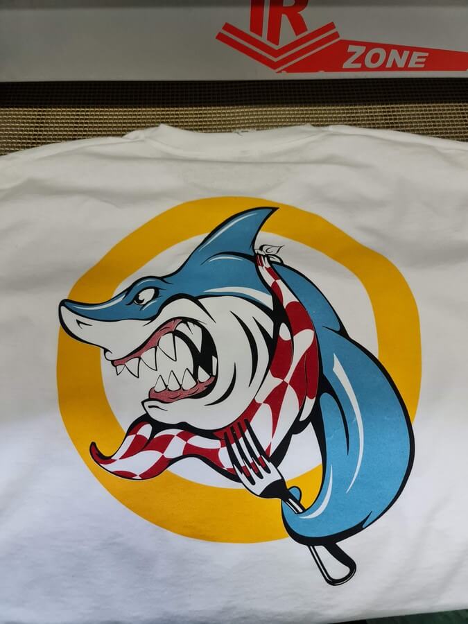 Three-colour halftone screen print on white cotton t-shirts