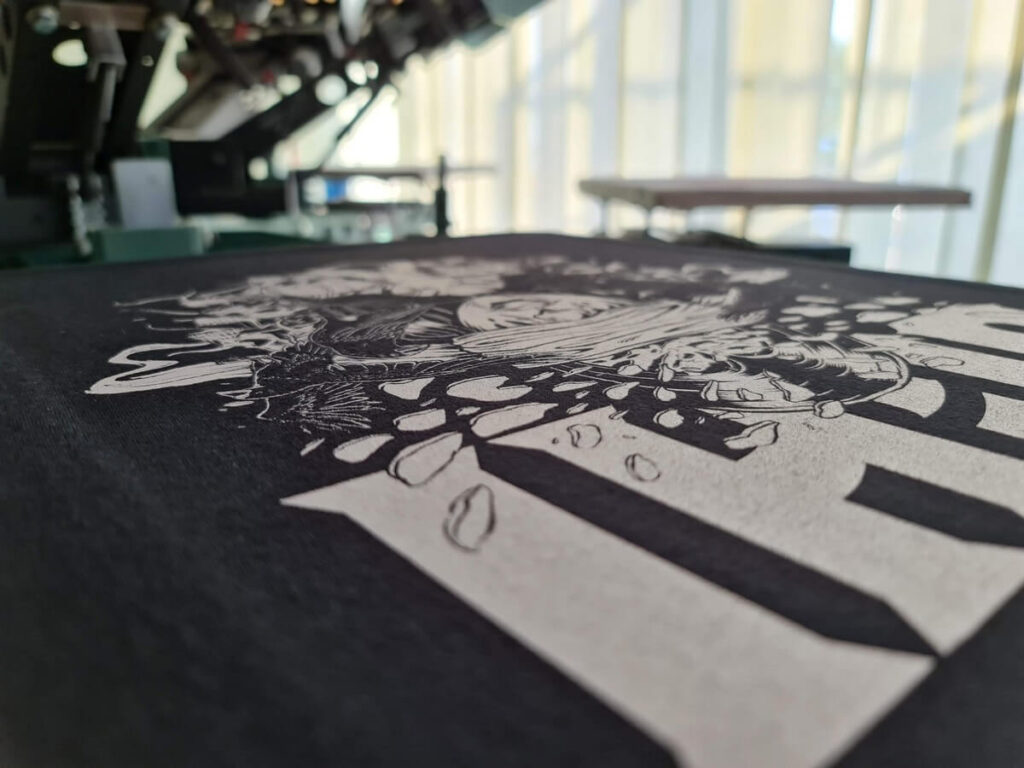 Screen-printed band t-shirts - single-colour print on a black t-shirt for the band Ochi