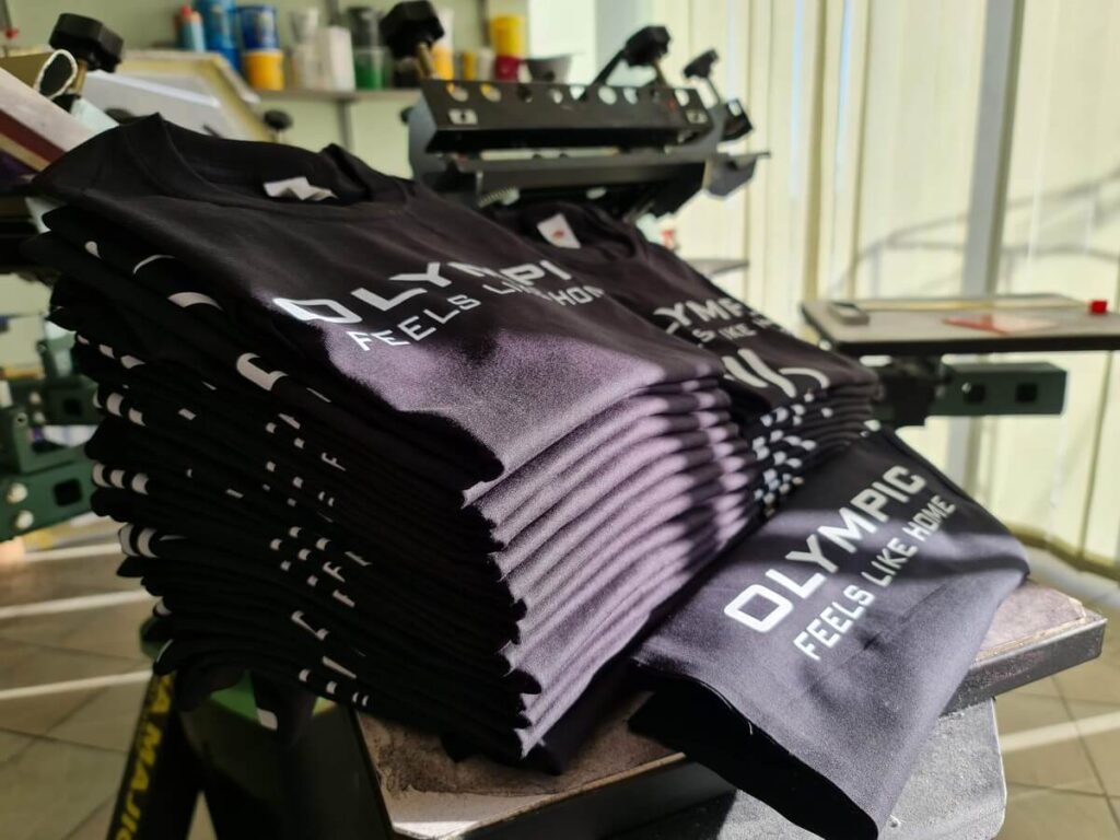 Black 100% cotton Fruit of the Loom t-shirt with a chest print - men's and women's fitted models
